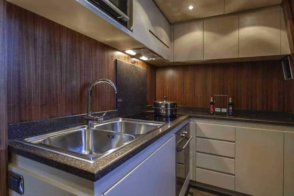 82 foot yacht kitchen white cabinets