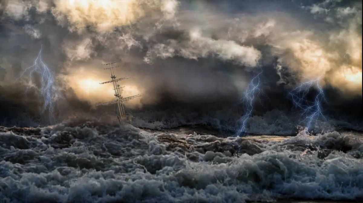 Lightning strikes and big waves with a drowning ship.