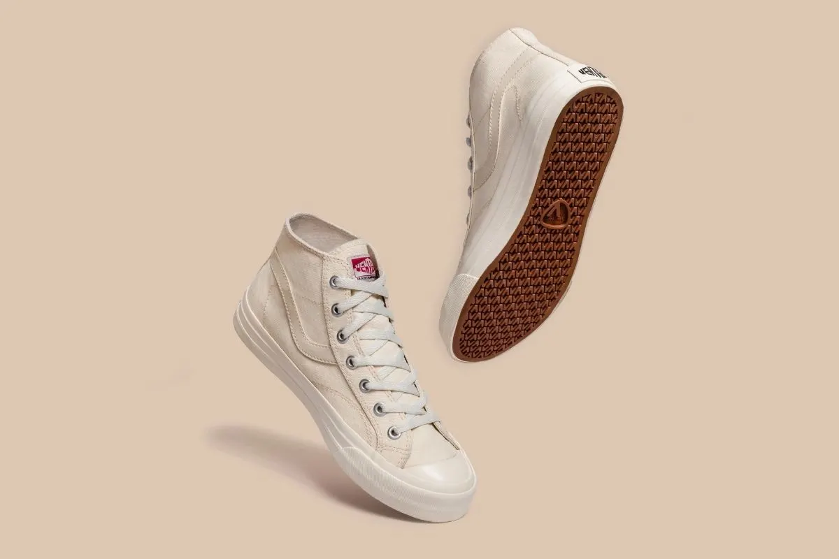 A canvas sneakers on isolated cream background.