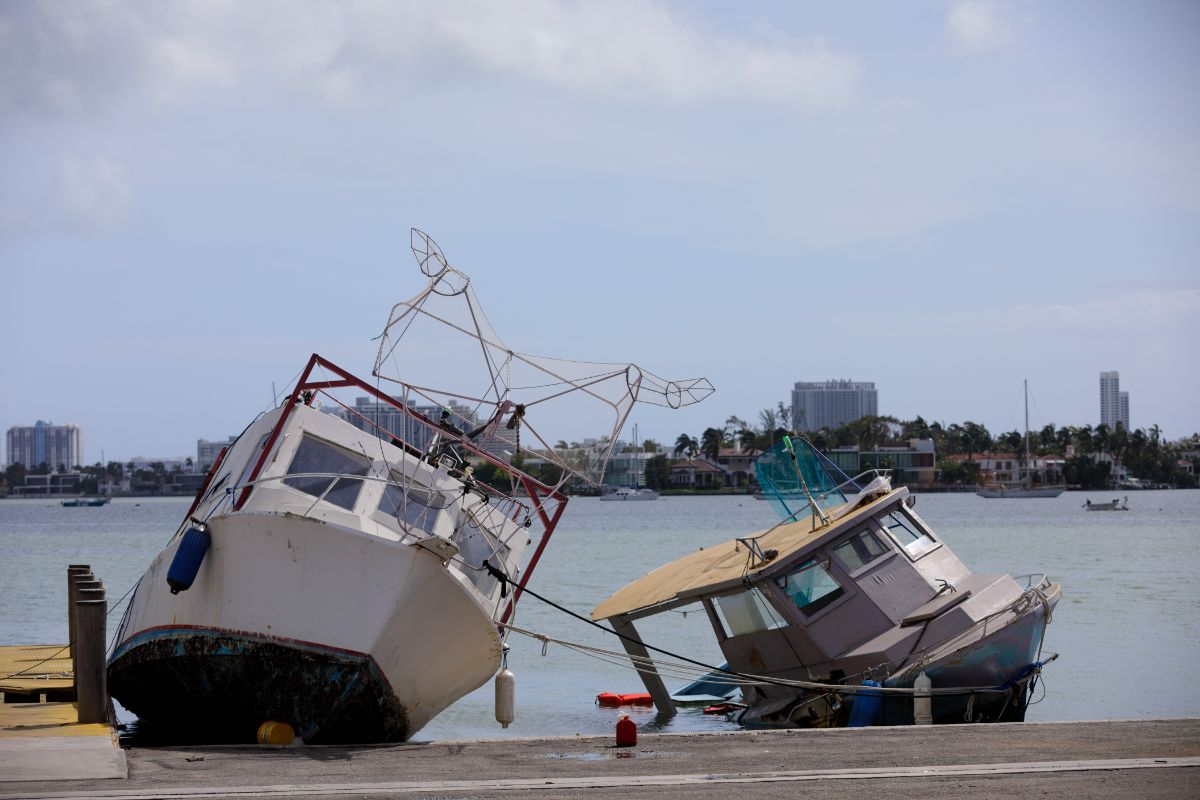 Two fishing boats at the side damaged.