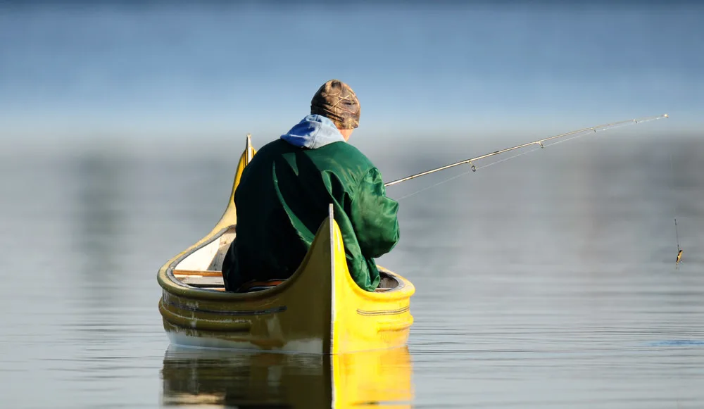 Fishing on a canoe