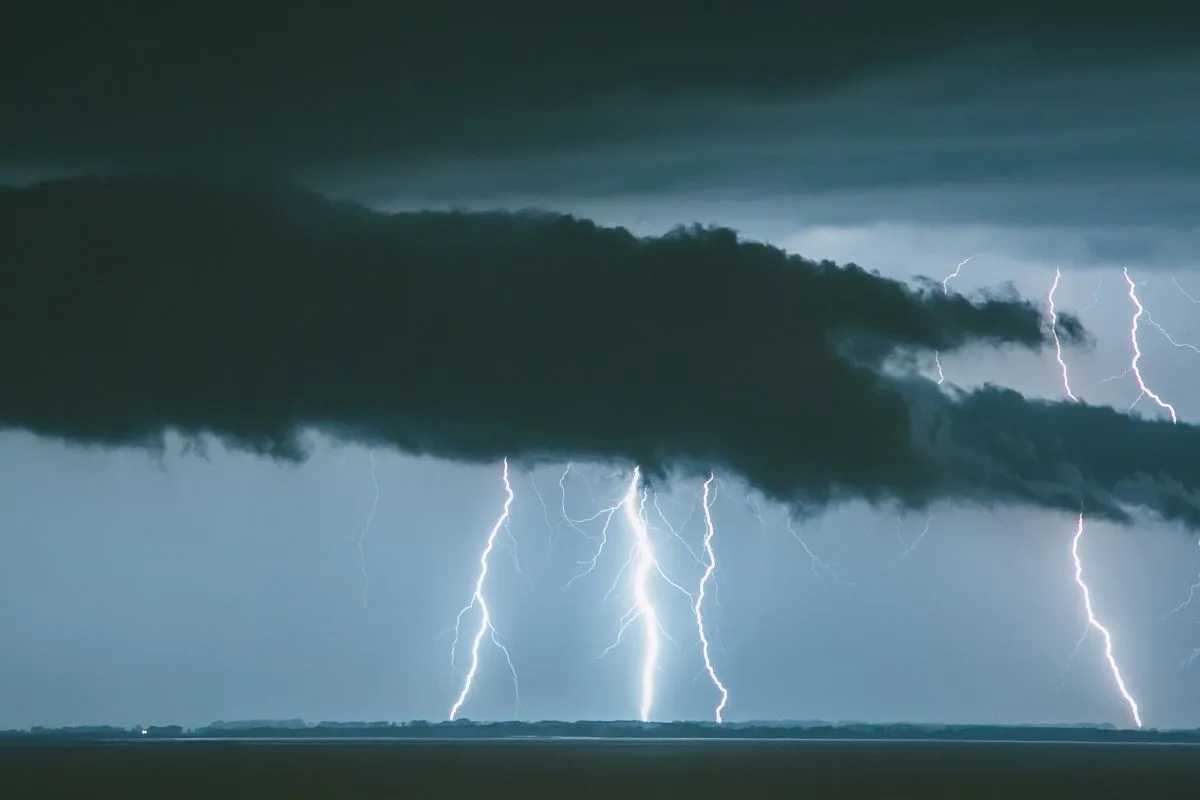 Numerous lightning strikes in the sea.