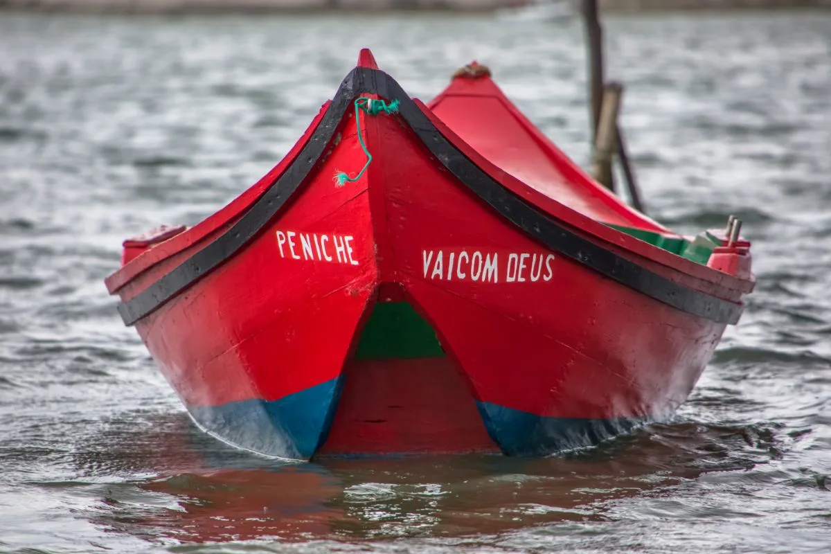 A detailed photo of a traditional fishingboat on the river.