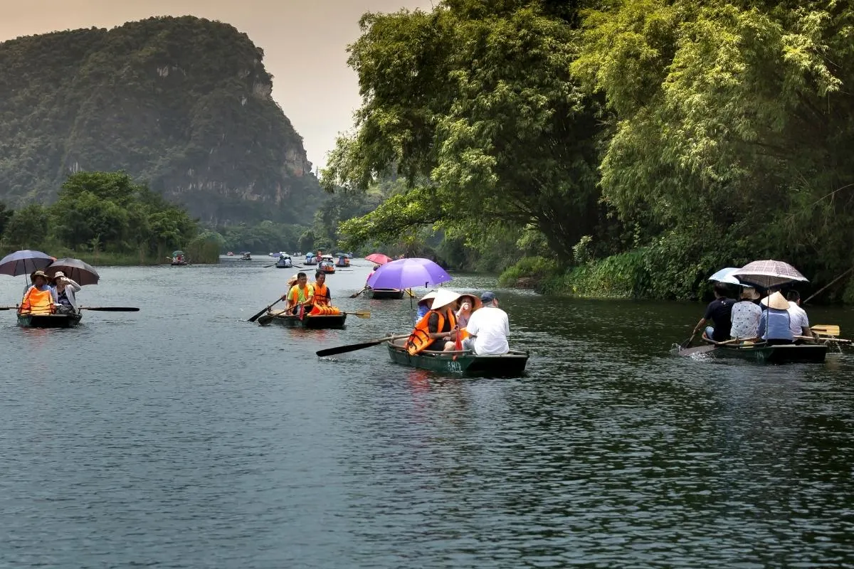 A photo of people riding jon boat.