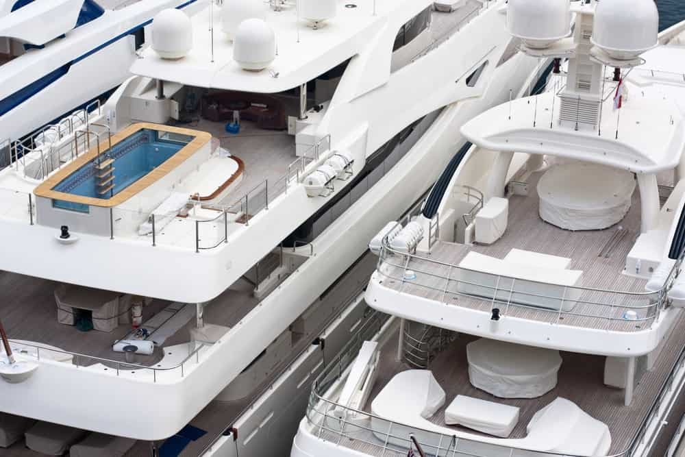 A pair of three-decker luxury yachts.