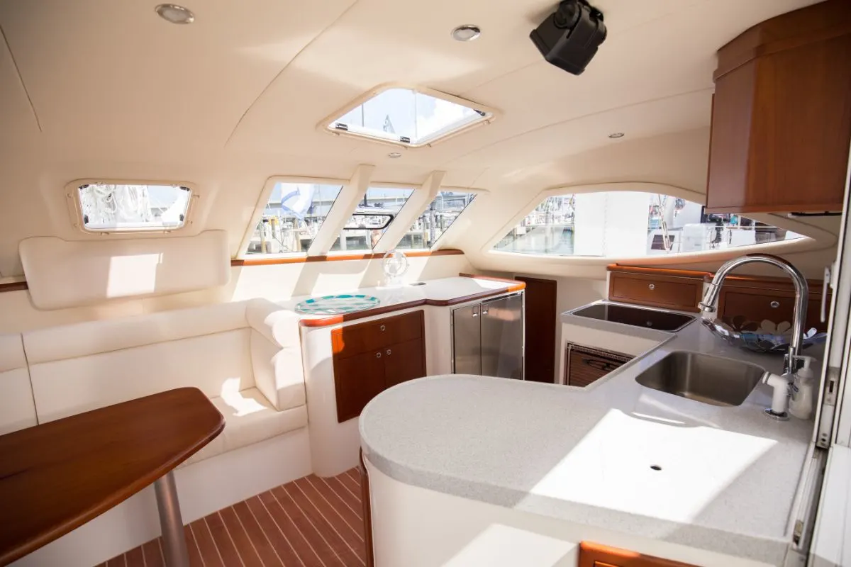 Luxury white yacht kitchen interior.