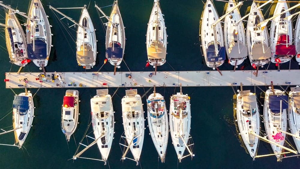 Aerial view of yachts at a yacht club.