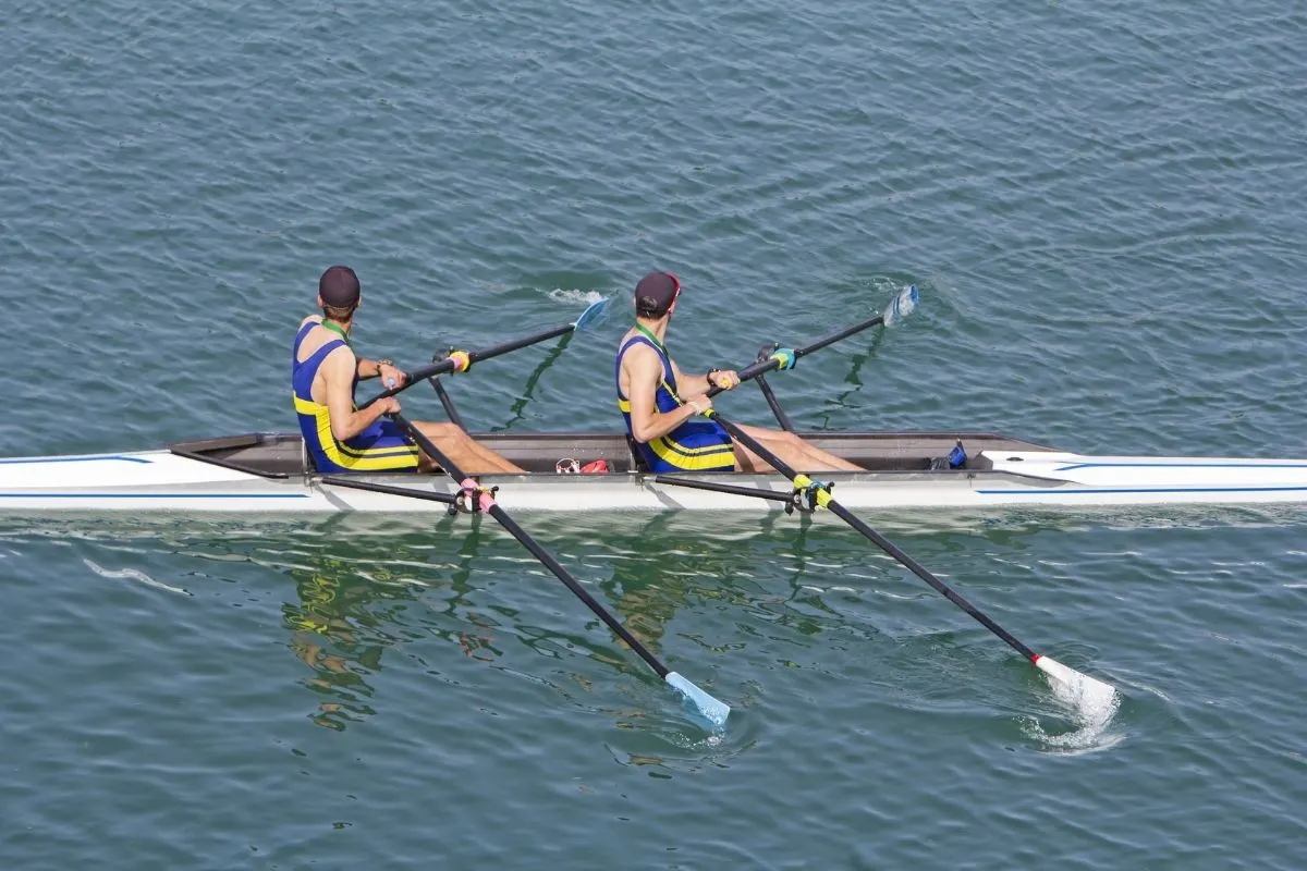 A photo of two men rowing for competition.