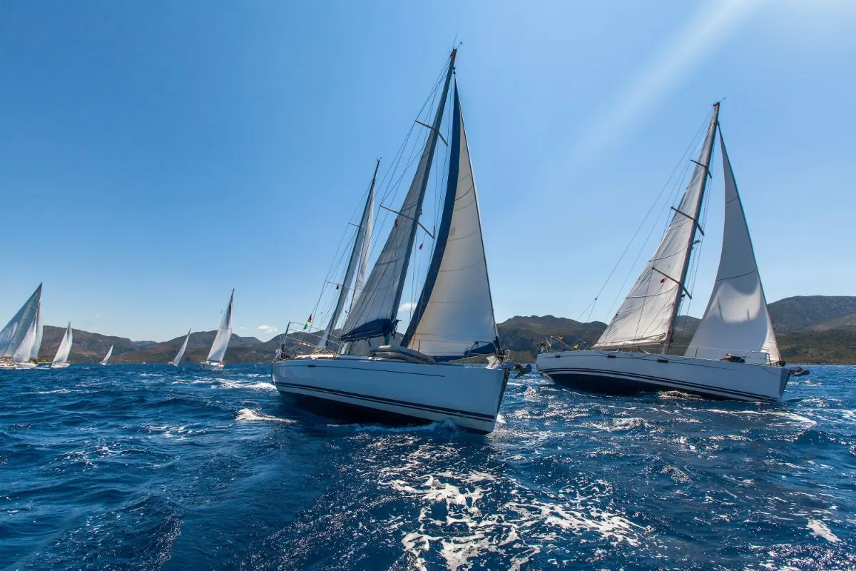 A photo of sailing regatta on the ocean.