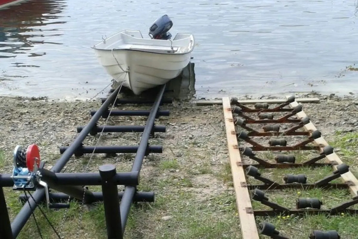 A photo of rollers for boat at the river.