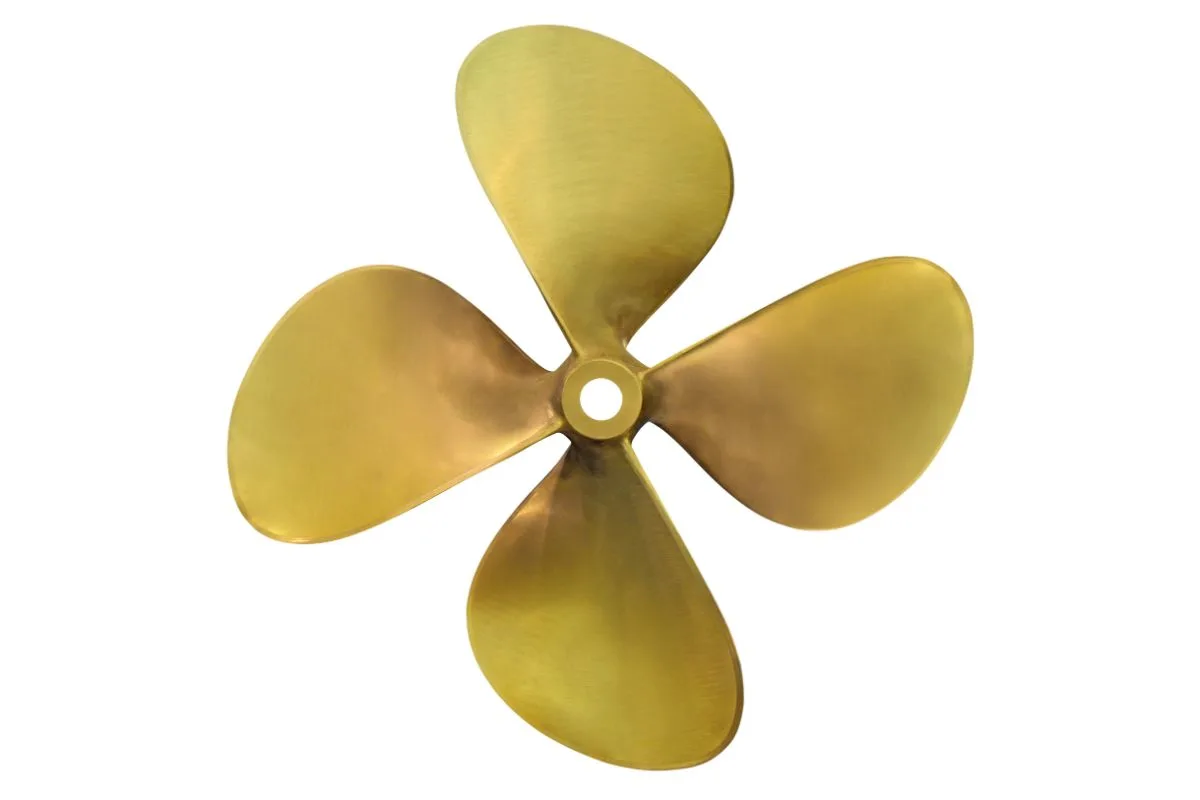 A four-bladed boat propeller in gold on a white background.