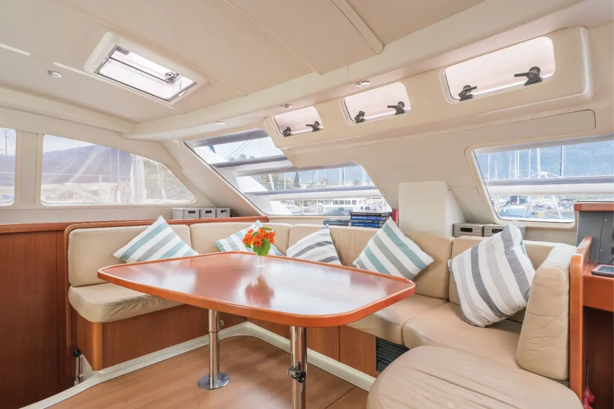 Beautiful interior display of a yacht with pleasant lounge area seats to chill on.