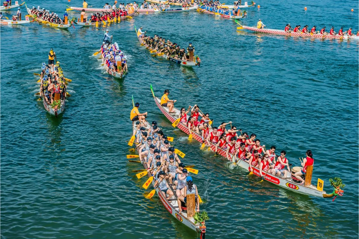 Top view shot of dragon boats festival race stanley beach.