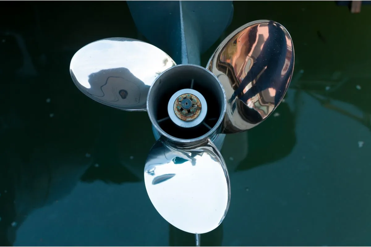 Shiny three blade boat propeller in a closer view.