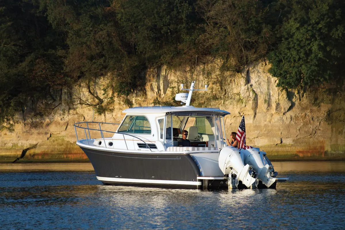 A brand new Back Cove 340 with it's owner onboard.