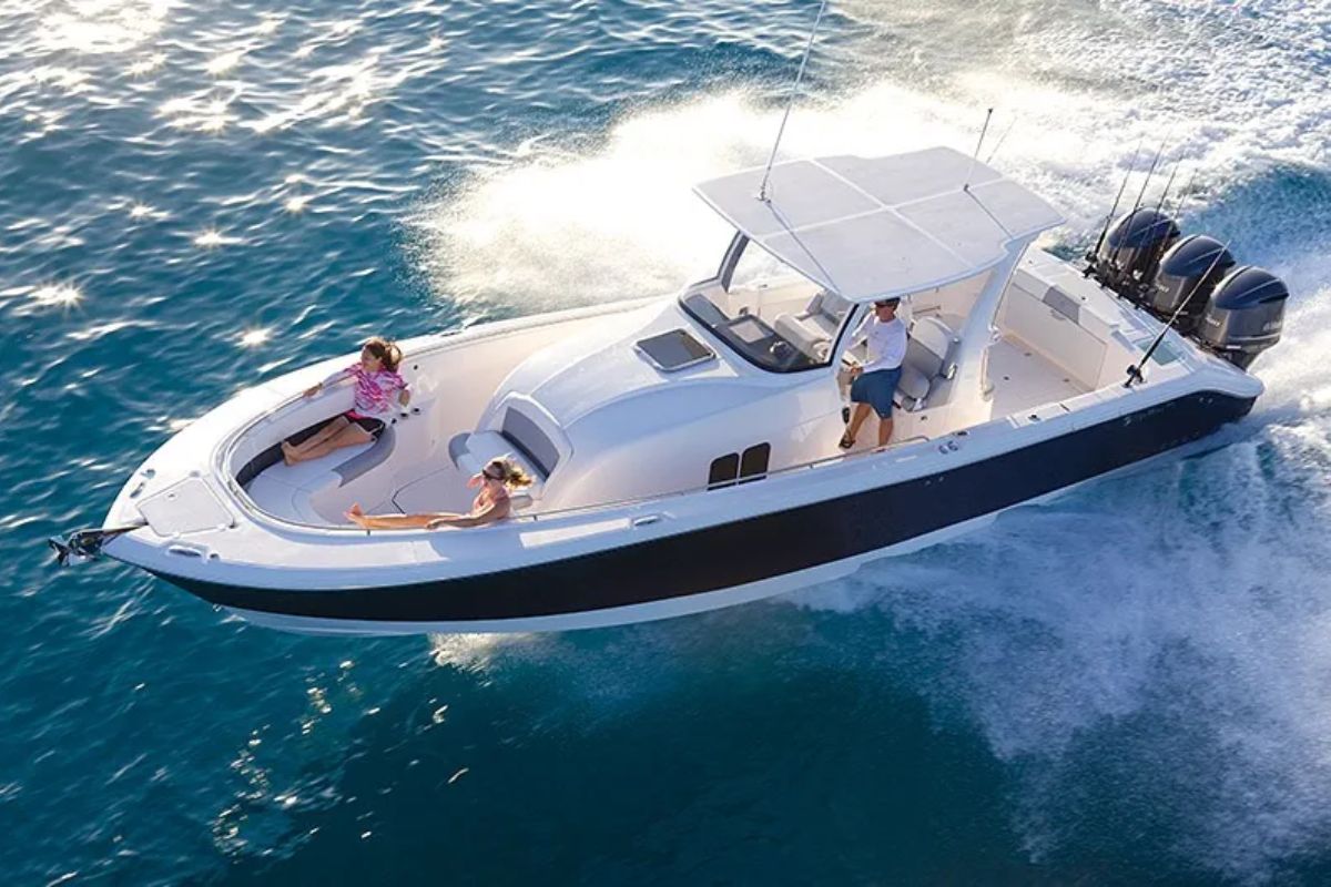 A family on vacation with their Edgewater 370CC yacht.