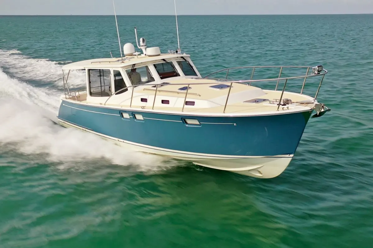 A front view MJM 43z yacht going full speed in the sea,