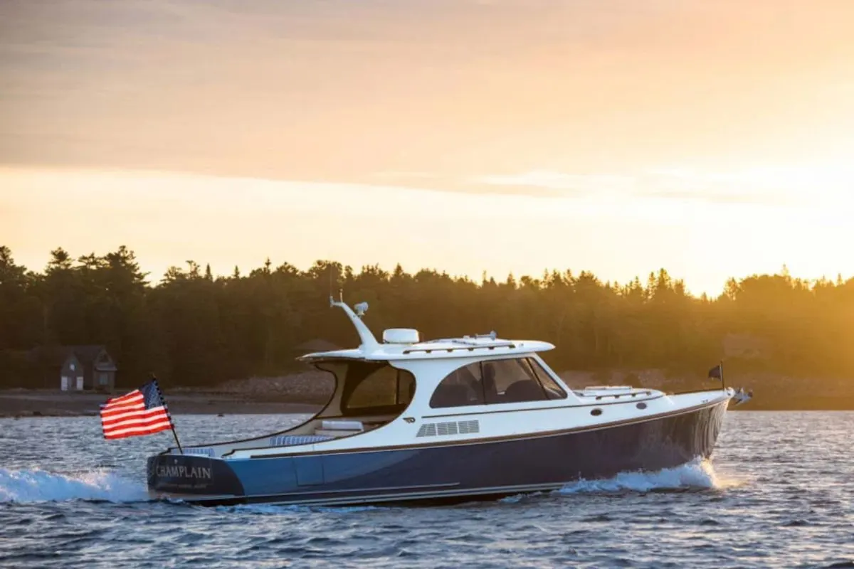 A picnic boat on the sea with beautiful sunset on the background.