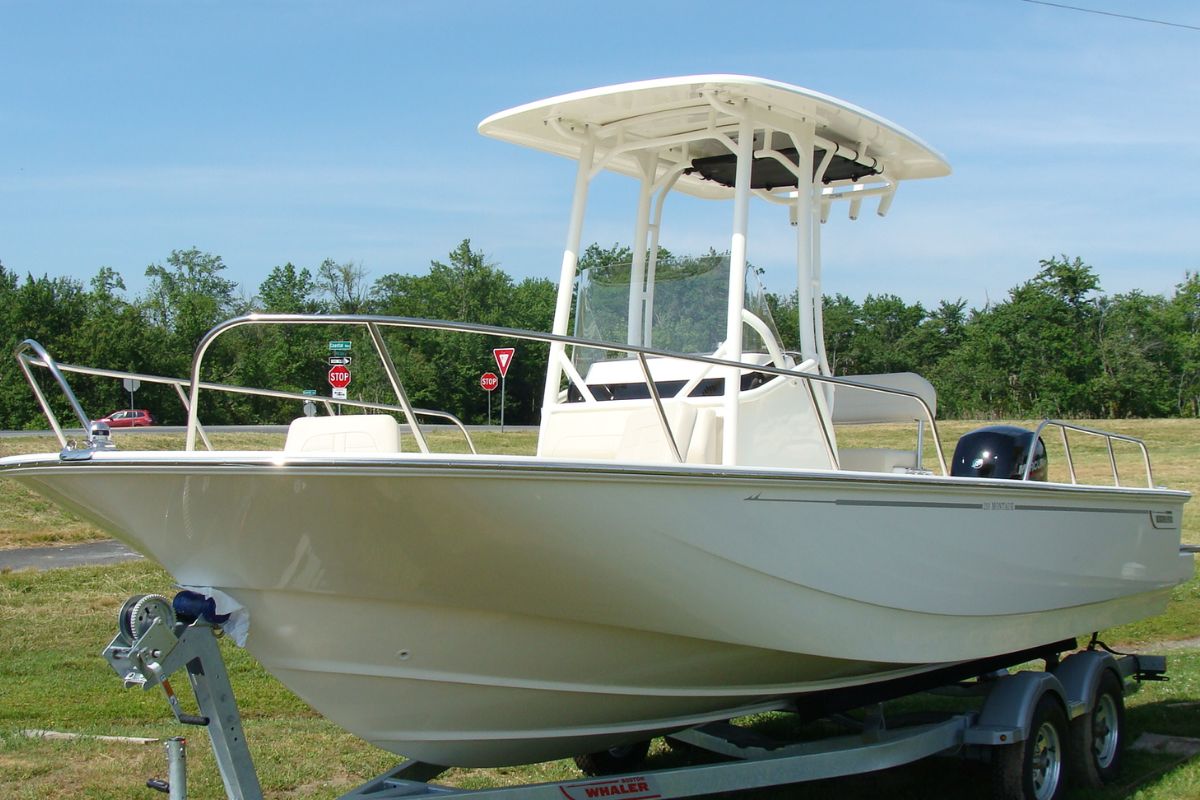 The all new 2023 model Boston Whaler 210 Montauk on a boat trailer.