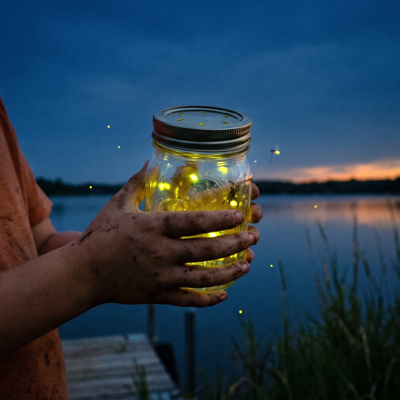 Catching Fireflies in a Mason Jar After Dark