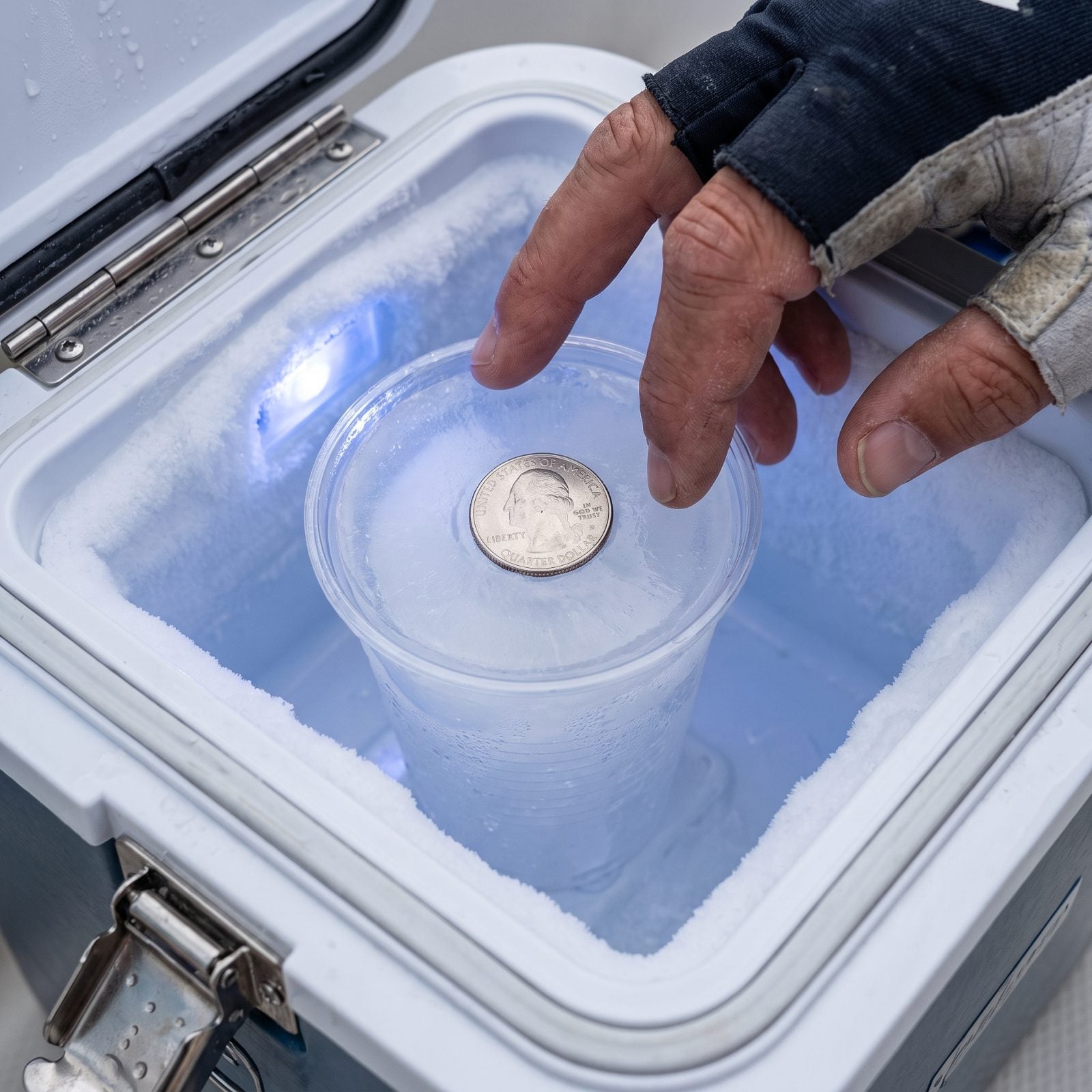 Freeze a Coin on Top of a Cup of Ice to Expose a Thawed Freezer