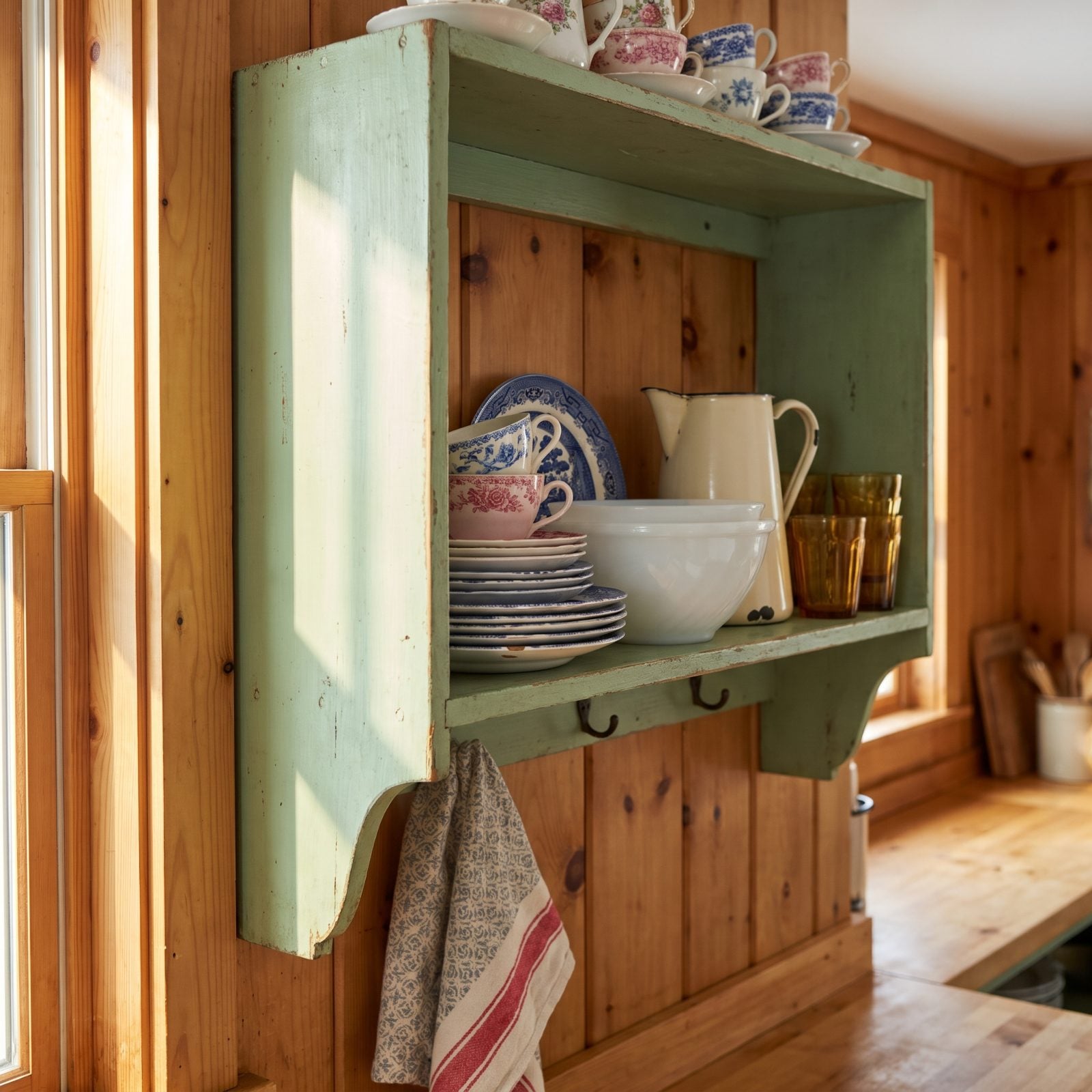 Mismatched Vintage Dishware on Open Shelves
