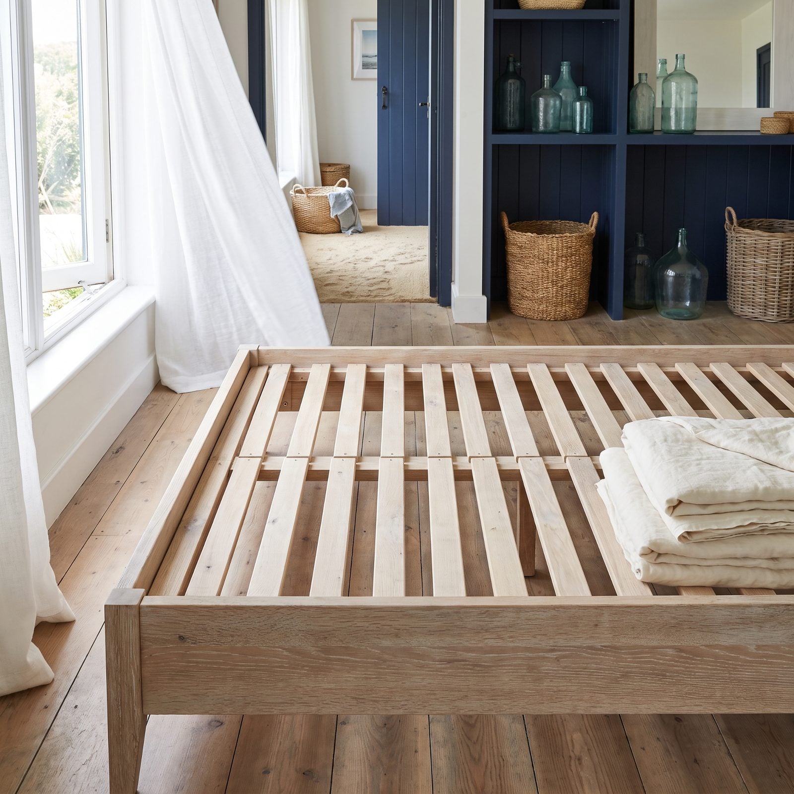 Use a Slatted Bed Base to Let Coastal Moisture Escape